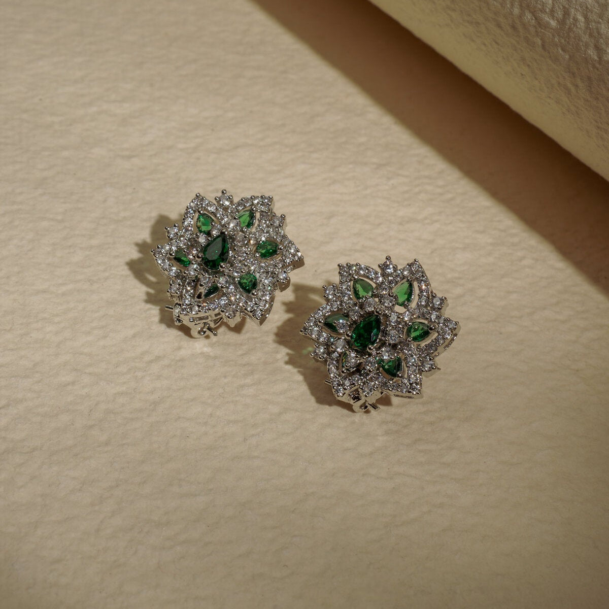 EMERALD FLOWER HALO STUDS